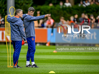 Netherlands assistant trainer Erwin Koeman and Netherlands assistant trainer Wim Jonk are present during the training and press conference f...