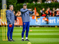 Netherlands assistant trainer Erwin Koeman and Netherlands assistant trainer Wim Jonk are present during the training and press conference f...