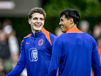 Netherlands players Guus Til and Tijjani Reijnders participate in the training and press conference for the Netherlands Nations League seaso...