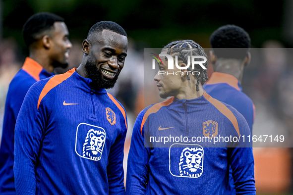 Netherlands players Lutsharel Geertruida and Xavi Simons participate in the training and press conference for the Netherlands Nations League...