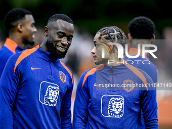 Netherlands players Lutsharel Geertruida and Xavi Simons participate in the training and press conference for the Netherlands Nations League...