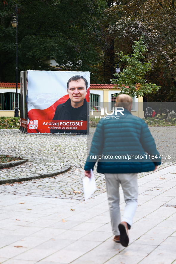 A banner with a picture of Belarusian-Polish journalist, Andrzej Poczobut, a political prisoner of Alexander Lukashenko regime, is seen in t...