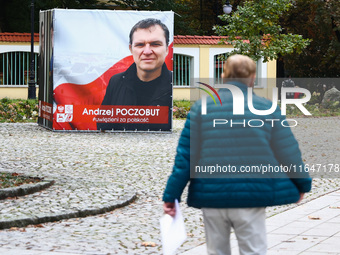 A banner with a picture of Belarusian-Polish journalist, Andrzej Poczobut, a political prisoner of Alexander Lukashenko regime, is seen in t...