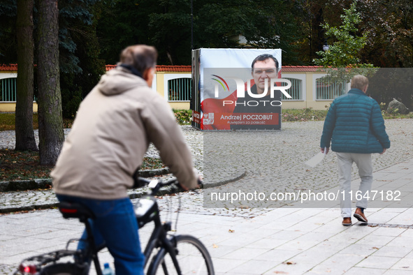 A banner with a picture of Belarusian-Polish journalist, Andrzej Poczobut, a political prisoner of Alexander Lukashenko regime, is seen in t...