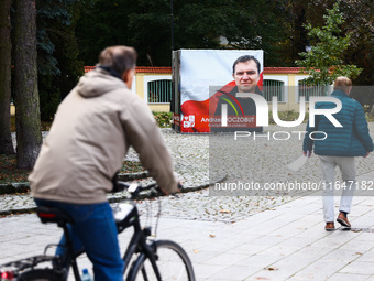 A banner with a picture of Belarusian-Polish journalist, Andrzej Poczobut, a political prisoner of Alexander Lukashenko regime, is seen in t...