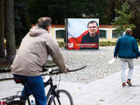 A banner with a picture of Belarusian-Polish journalist, Andrzej Poczobut, a political prisoner of Alexander Lukashenko regime, is seen in t...