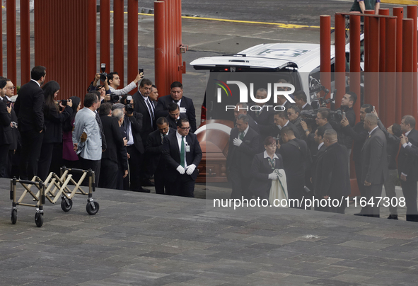 Funeral home staff lower the coffin of Ifigenia Martinez, President of the Chamber of Deputies, in Mexico City, Mexico, on October 7, 2024....