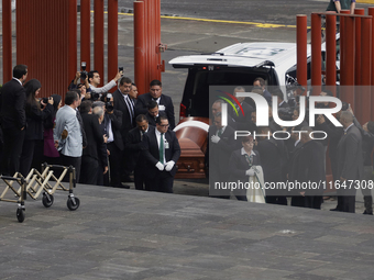 Funeral home staff lower the coffin of Ifigenia Martinez, President of the Chamber of Deputies, in Mexico City, Mexico, on October 7, 2024....