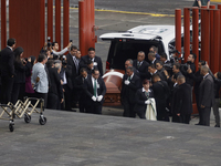 Funeral home staff lower the coffin of Ifigenia Martinez, President of the Chamber of Deputies, in Mexico City, Mexico, on October 7, 2024....