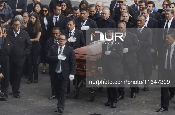 Funeral home staff carry the coffin of Ifigenia Martinez, President of the Chamber of Deputies, in Mexico City, Mexico, on October 7, 2024....