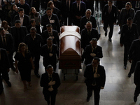 Funeral home staff carry the coffin of Ifigenia Martinez, President of the Chamber of Deputies, in Mexico City, Mexico, on October 7, 2024....