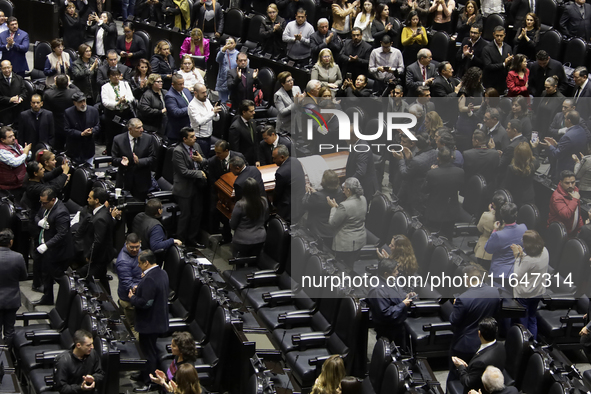 Funeral home staff carry the coffin of Ifigenia Martinez, President of the Chamber of Deputies, in Mexico City, Mexico, on October 7, 2024....