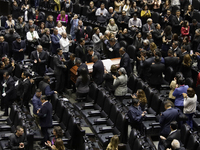 Funeral home staff carry the coffin of Ifigenia Martinez, President of the Chamber of Deputies, in Mexico City, Mexico, on October 7, 2024....