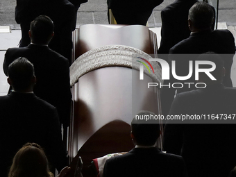 Funeral home staff carry the coffin of Ifigenia Martinez, President of the Chamber of Deputies, in Mexico City, Mexico, on October 7, 2024....