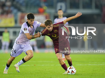 Tommaso Baldanzi attacking midfield of Roma and Italy and Beñat Prados central midfield of Athletic Club and Spain compete for the ball duri...