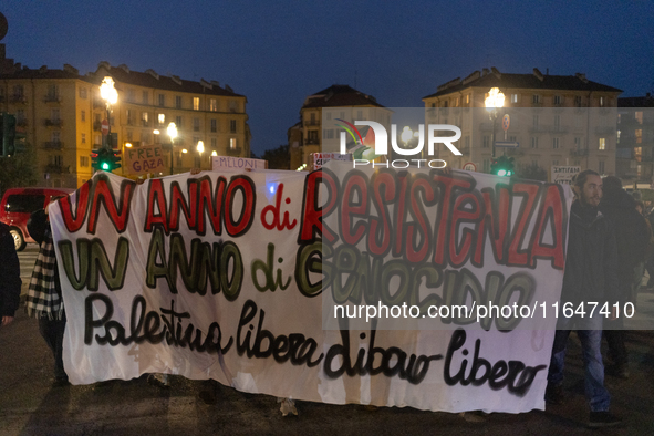 Pro-Palestinian protesters participate in demonstrations in Turin, Italy, on October 7, 2024. Despite restrictions issued by local police fo...