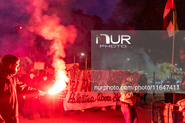 Pro-Palestinian protesters participate in demonstrations in Turin, Italy, on October 7, 2024. Despite restrictions issued by local police fo...