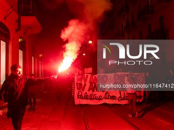 Pro-Palestinian protesters participate in demonstrations in Turin, Italy, on October 7, 2024. Despite restrictions issued by local police fo...