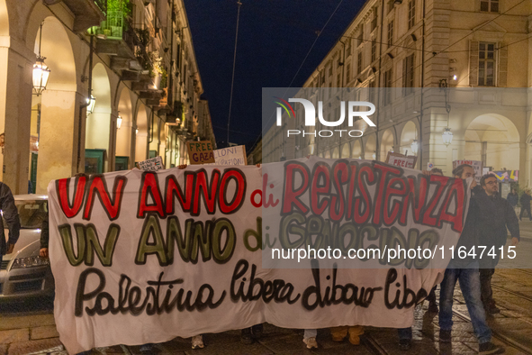 Pro-Palestinian protesters participate in demonstrations in Turin, Italy, on October 7, 2024. Despite restrictions issued by local police fo...