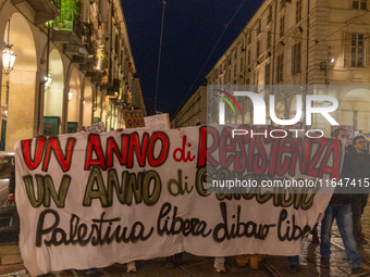 Pro-Palestinian protesters participate in demonstrations in Turin, Italy, on October 7, 2024. Despite restrictions issued by local police fo...