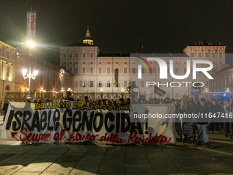 Pro-Palestinian protesters participate in demonstrations in Turin, Italy, on October 7, 2024. Despite restrictions issued by local police fo...