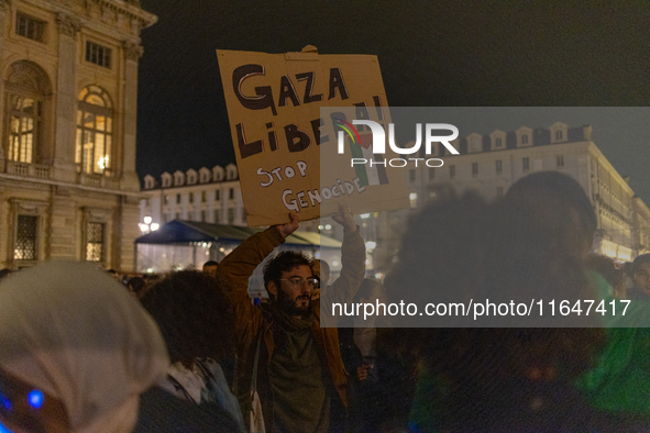 Pro-Palestinian protesters participate in demonstrations in Turin, Italy, on October 7, 2024. Despite restrictions issued by local police fo...