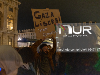 Pro-Palestinian protesters participate in demonstrations in Turin, Italy, on October 7, 2024. Despite restrictions issued by local police fo...