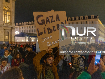 Pro-Palestinian protesters participate in demonstrations in Turin, Italy, on October 7, 2024. Despite restrictions issued by local police fo...