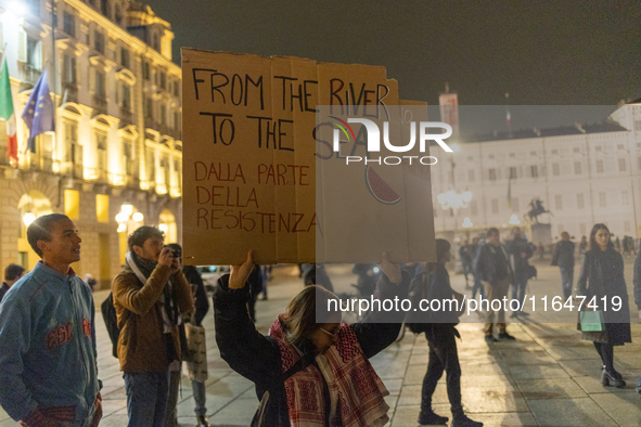 Pro-Palestinian protesters participate in demonstrations in Turin, Italy, on October 7, 2024. Despite restrictions issued by local police fo...