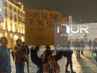 Pro-Palestinian protesters participate in demonstrations in Turin, Italy, on October 7, 2024. Despite restrictions issued by local police fo...