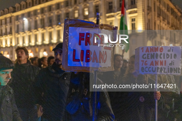 Pro-Palestinian protesters participate in demonstrations in Turin, Italy, on October 7, 2024. Despite restrictions issued by local police fo...