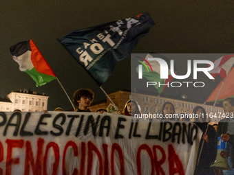 Pro-Palestinian protesters participate in demonstrations in Turin, Italy, on October 7, 2024. Despite restrictions issued by local police fo...