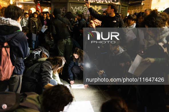 Pro-Palestinian demonstrators in Turin, Italy, project the names of all those killed in Israeli military actions in the Gaza Strip onto the...