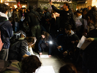 Pro-Palestinian demonstrators in Turin, Italy, project the names of all those killed in Israeli military actions in the Gaza Strip onto the...