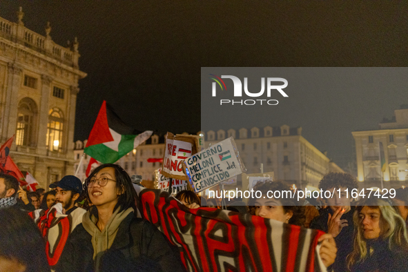 Pro-Palestinian protesters participate in demonstrations in Turin, Italy, on October 7, 2024. Despite restrictions issued by local police fo...