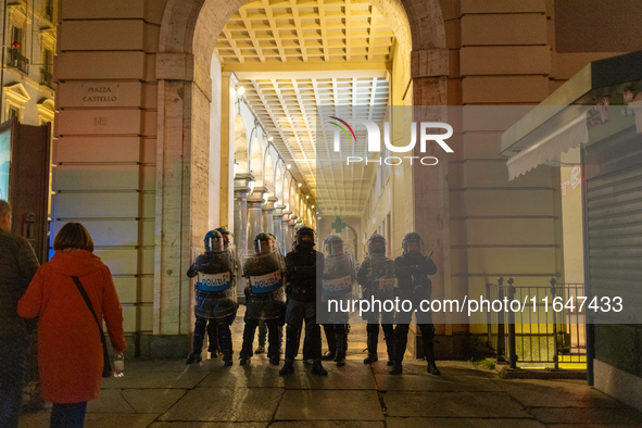 Pro-Palestinian protesters participate in demonstrations in Turin, Italy, on October 7, 2024. Despite restrictions issued by local police fo...