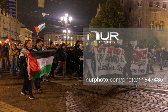 Pro-Palestinian protesters participate in demonstrations in Turin, Italy, on October 7, 2024. Despite restrictions issued by local police fo...