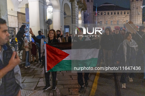 Pro-Palestinian protesters participate in demonstrations in Turin, Italy, on October 7, 2024. Despite restrictions issued by local police fo...