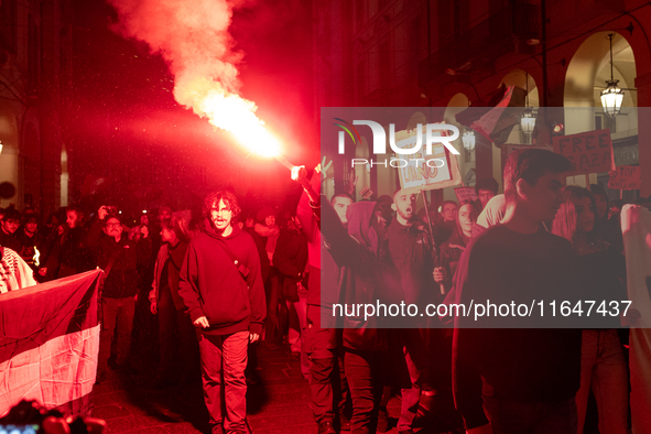 Pro-Palestinian protesters participate in demonstrations in Turin, Italy, on October 7, 2024. Despite restrictions issued by local police fo...