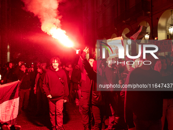 Pro-Palestinian protesters participate in demonstrations in Turin, Italy, on October 7, 2024. Despite restrictions issued by local police fo...