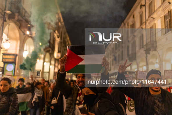 Pro-Palestinian protesters participate in demonstrations in Turin, Italy, on October 7, 2024. Despite restrictions issued by local police fo...