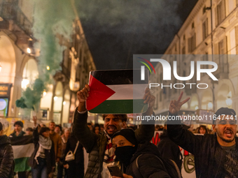 Pro-Palestinian protesters participate in demonstrations in Turin, Italy, on October 7, 2024. Despite restrictions issued by local police fo...