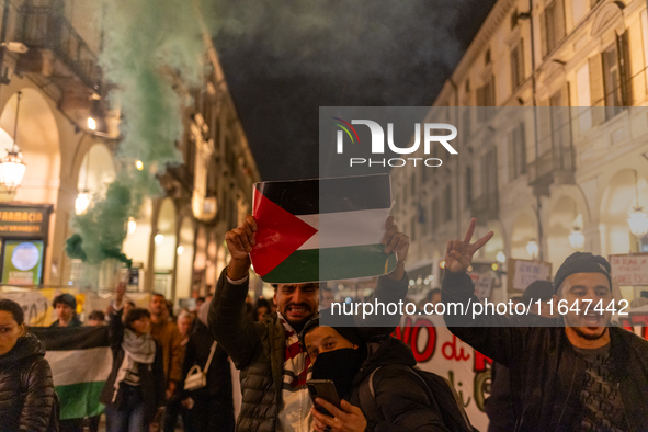 Pro-Palestinian protesters participate in demonstrations in Turin, Italy, on October 7, 2024. Despite restrictions issued by local police fo...