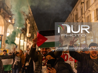 Pro-Palestinian protesters participate in demonstrations in Turin, Italy, on October 7, 2024. Despite restrictions issued by local police fo...