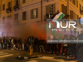 Pro-Palestinian protesters participate in demonstrations in Turin, Italy, on October 7, 2024. Despite restrictions issued by local police fo...