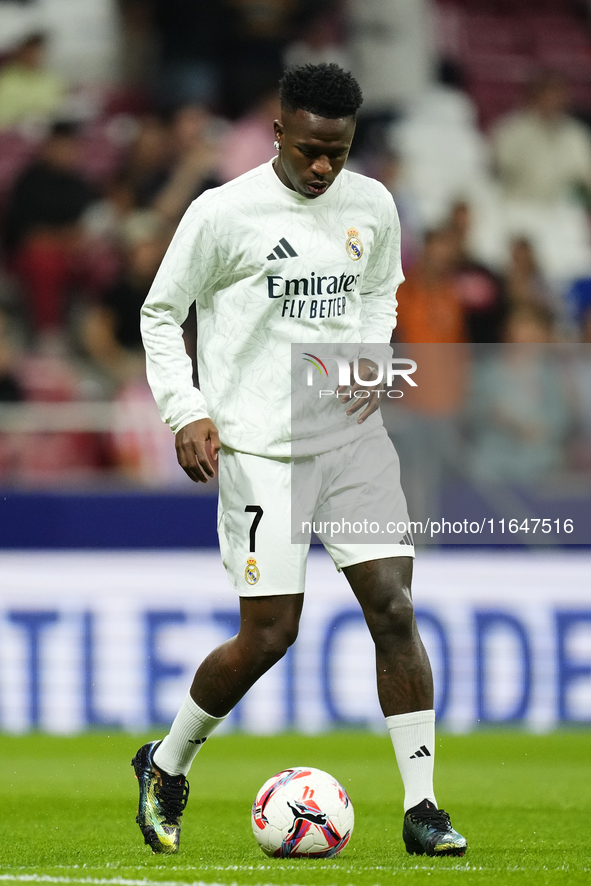 Vinicius Junior left winger of Real Madrid and Brazil during the warm-up before the LaLiga match between Atletico de Madrid and Real Madrid...