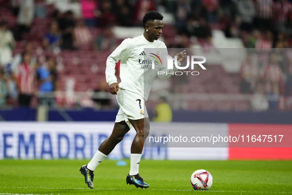 Vinicius Junior left winger of Real Madrid and Brazil during the warm-up before the LaLiga match between Atletico de Madrid and Real Madrid...