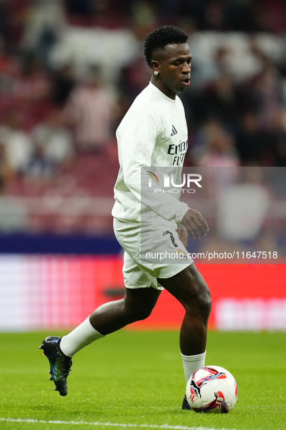 Vinicius Junior left winger of Real Madrid and Brazil during the warm-up before the LaLiga match between Atletico de Madrid and Real Madrid...