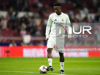 Vinicius Junior left winger of Real Madrid and Brazil during the warm-up before the LaLiga match between Atletico de Madrid and Real Madrid...