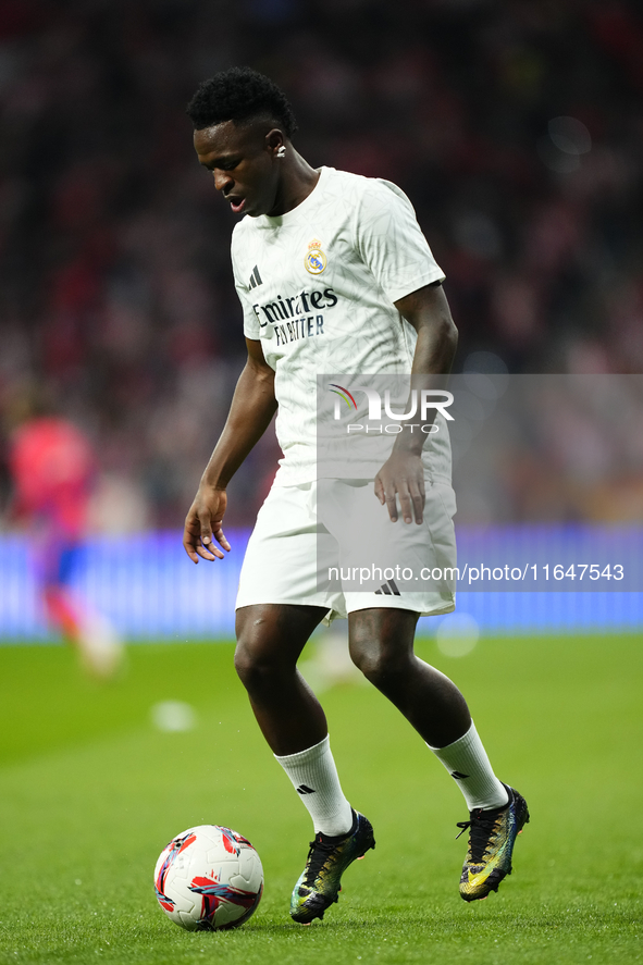 Vinicius Junior left winger of Real Madrid and Brazil during the warm-up before the LaLiga match between Atletico de Madrid and Real Madrid...